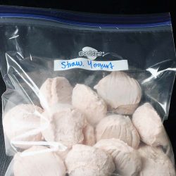 frozen balls of yogurt in bag.