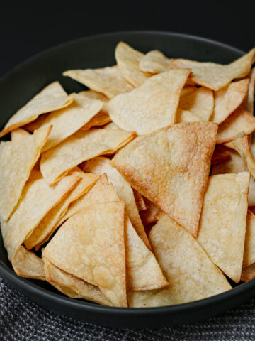 close up of chips in black bowl.