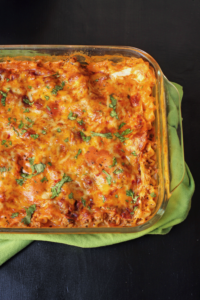 casserole of mexican lasagna on green cloth