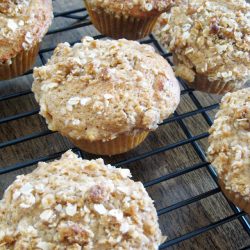 cooking rack with oat topped muffins