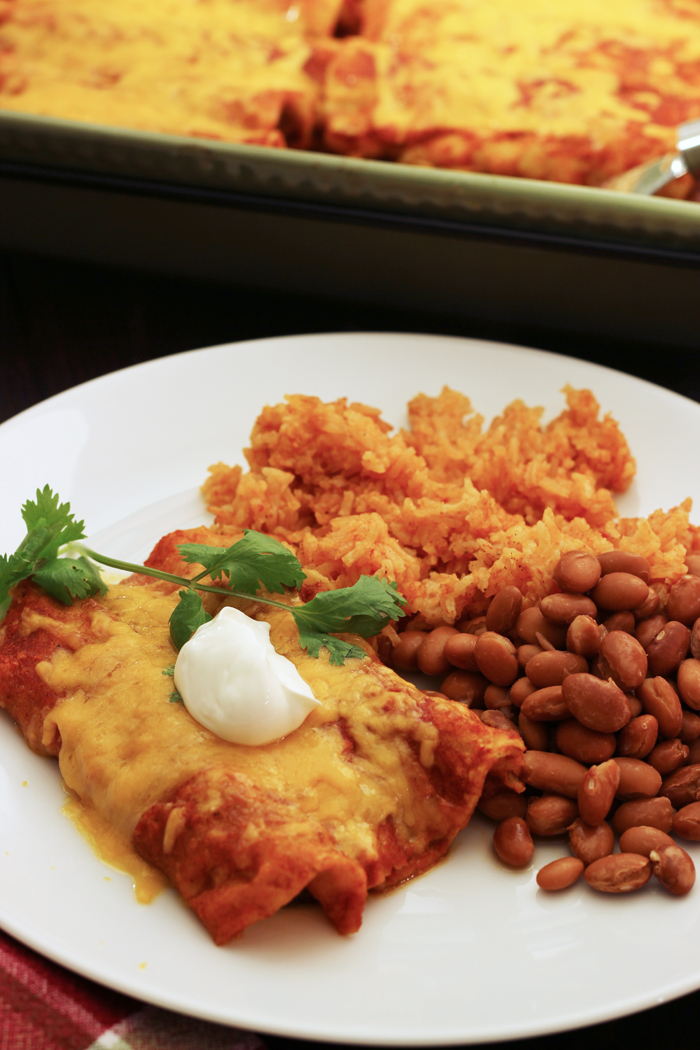 enchilada plate with beans and rice