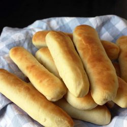 cloth lined basket with hot dog buns