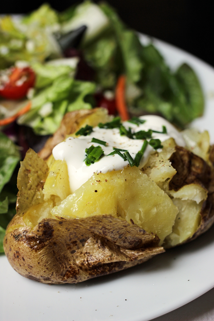 baked potato and salad