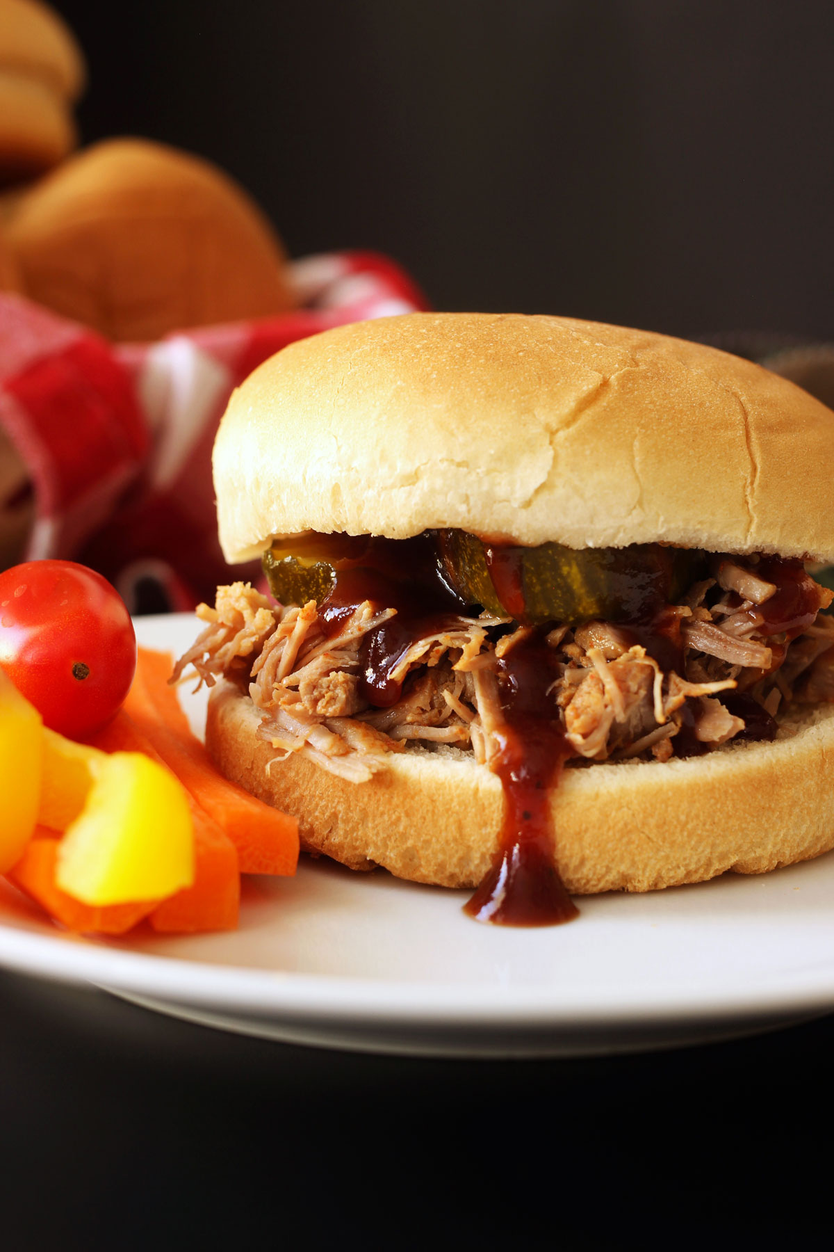side view of a pulled pork sandwich.
