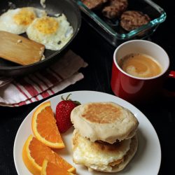 breakfast sandwich with table spread