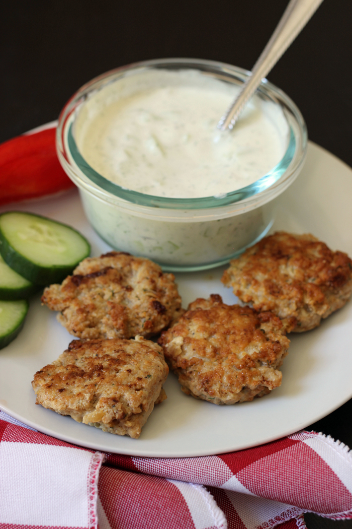 chicken patties with tzatziki dip on plate