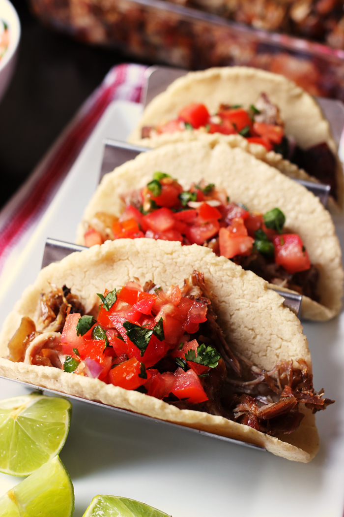 three pork carnitas tacos