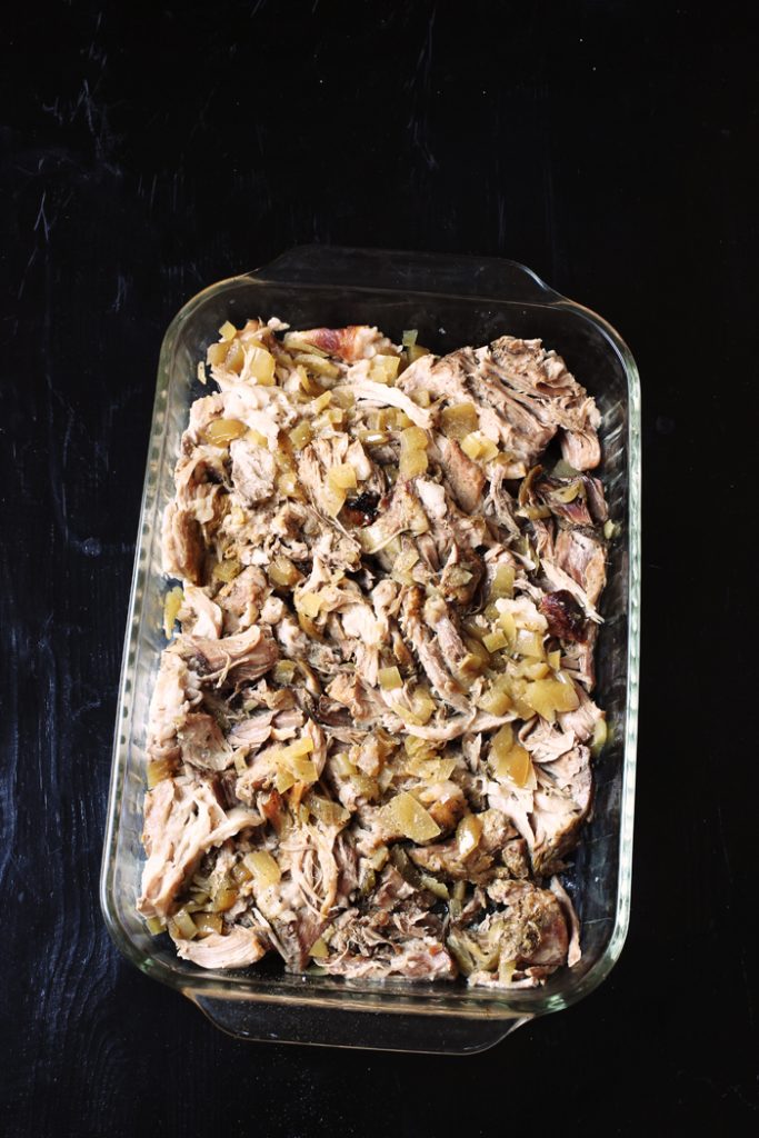 carnitas meat in glass baking dish