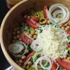 A wooden bowl of Italian Salad