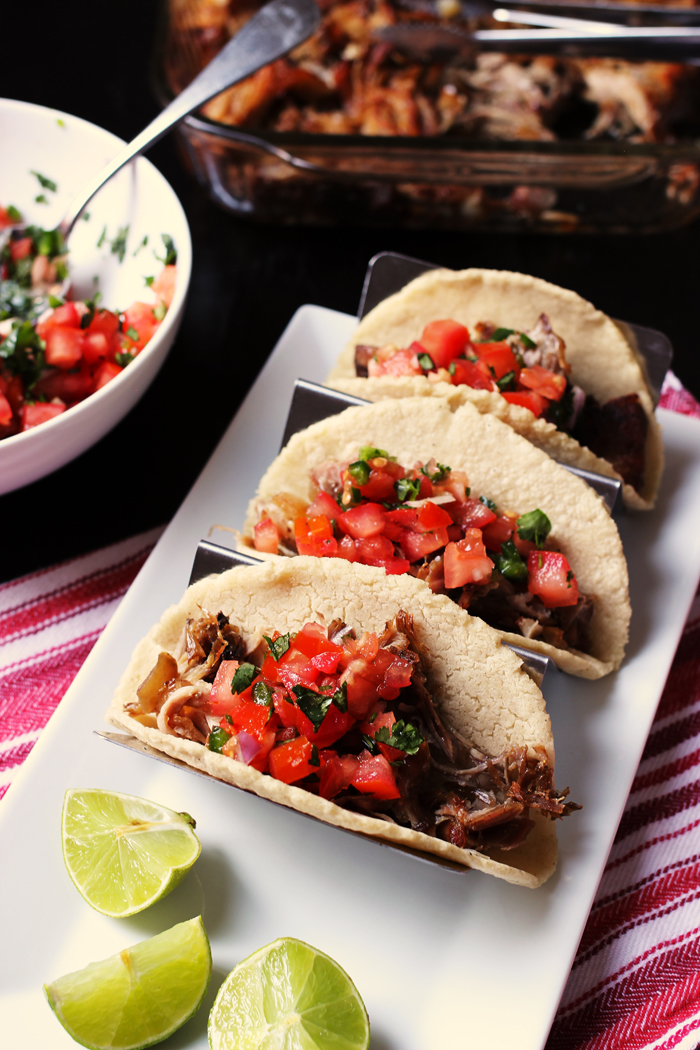 A trio of tacos on taco holder