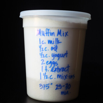 muffins in plastic tub with blue writing
