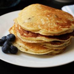 A stack of pancakes on a plate