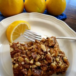 slice of coffeecake on plate with lemon slice