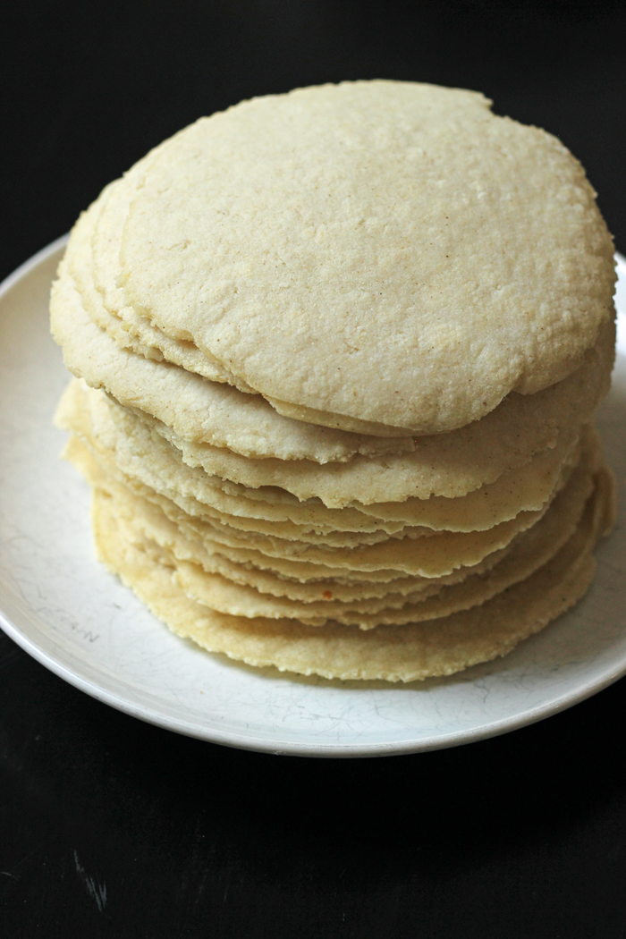 A stack of tortillas on a plate