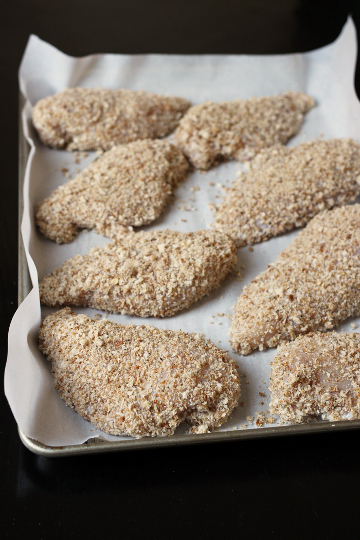 chicken parmesan on tray ready to bake