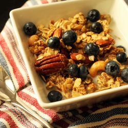 maple granola in bowl on striped napkin