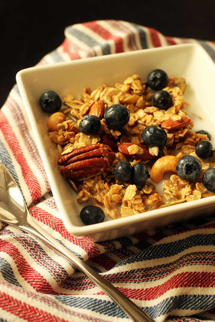 maple granola in bowl on striped napkin