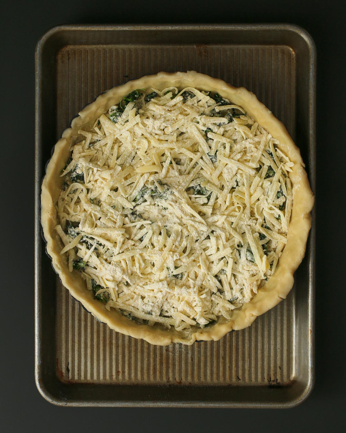 cheese mixture over spinach in pie shell.