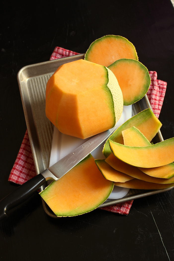 cutting melon for a fruit tray