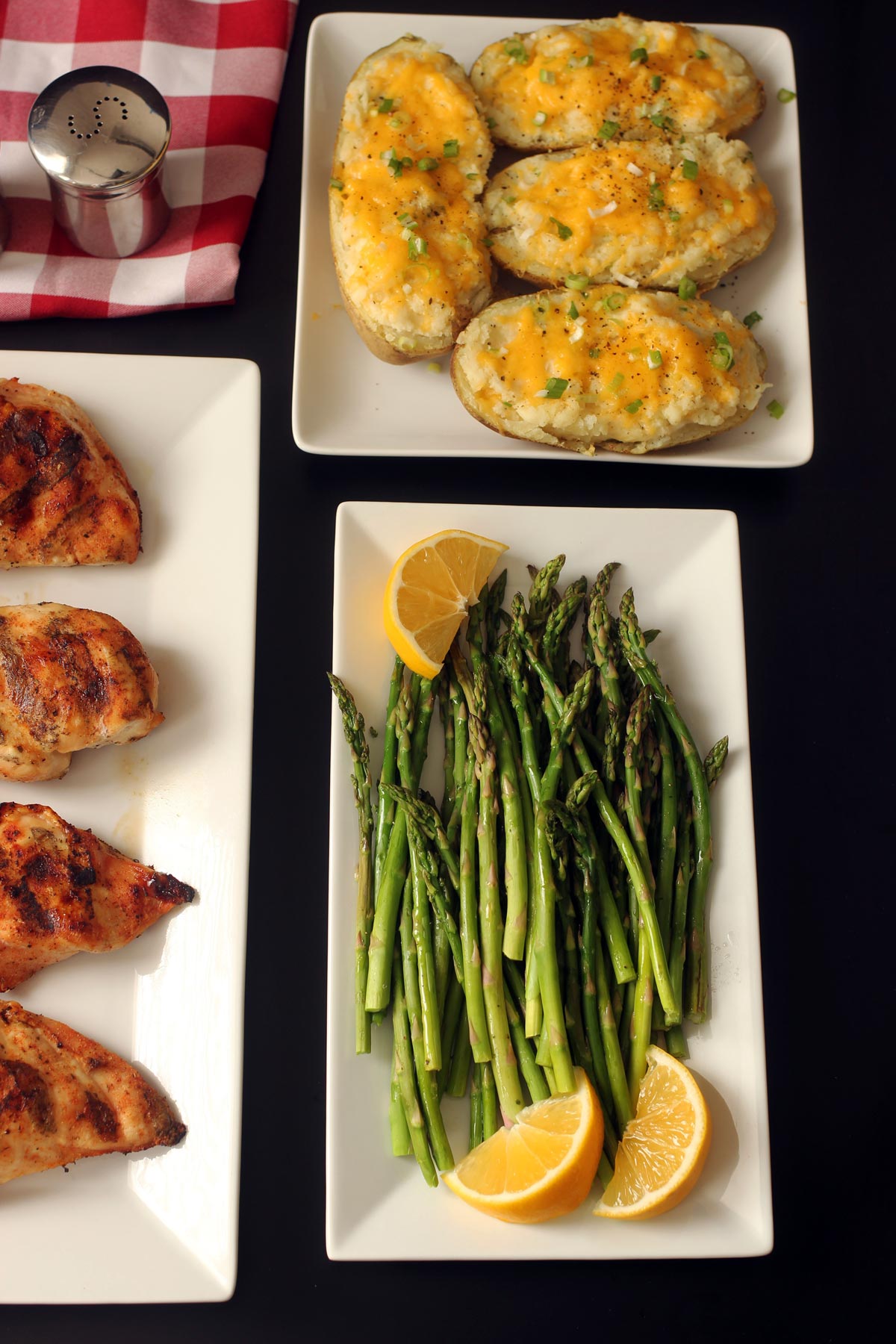 dinner table set with asparagus platter