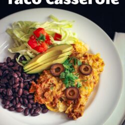 plate of taco casserole with salad and black beans with text overlay.
