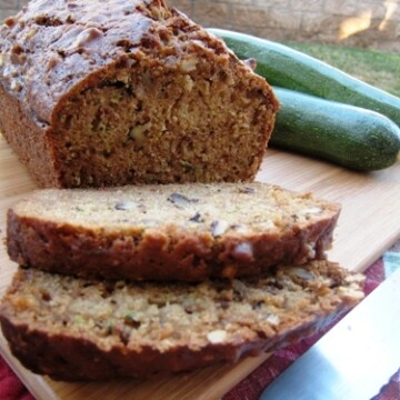 A loaf of zucchini bread on a board