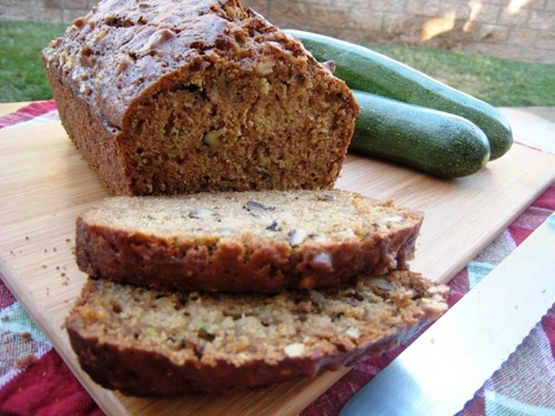 A loaf of zucchini bread on a board