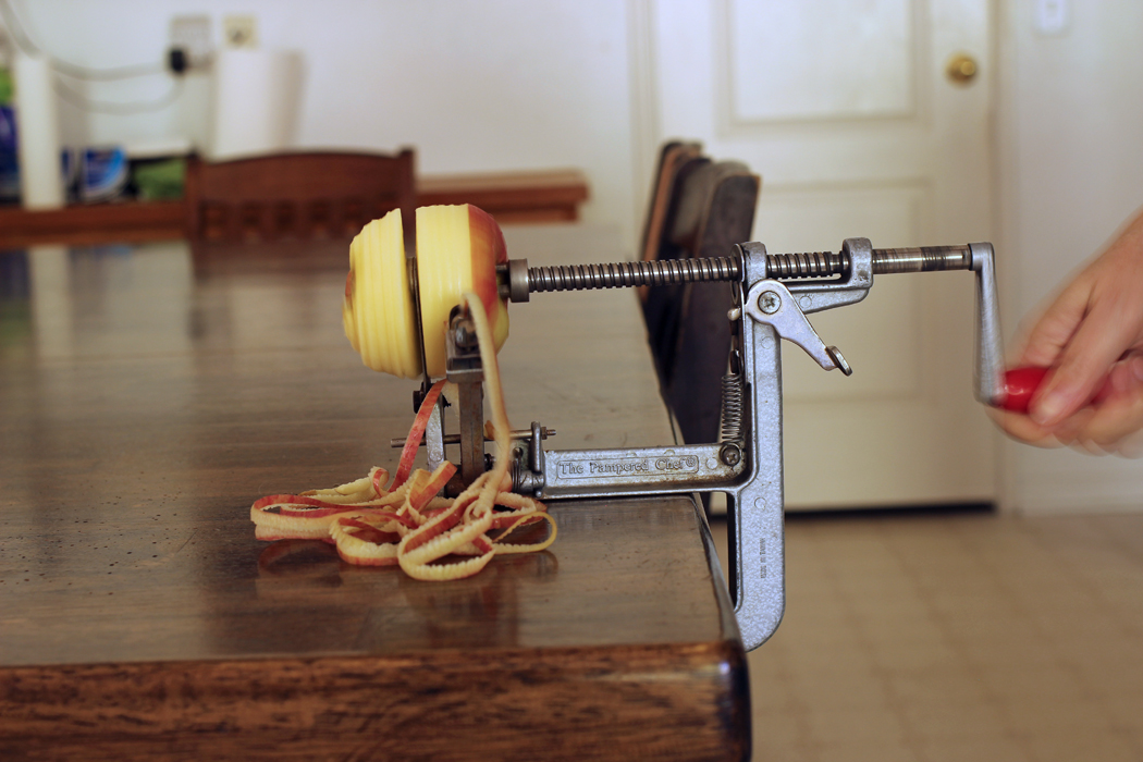 apple on apple slicer with peels