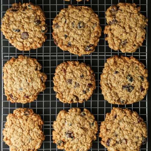 array of oatmeal craisin cookies on rack.