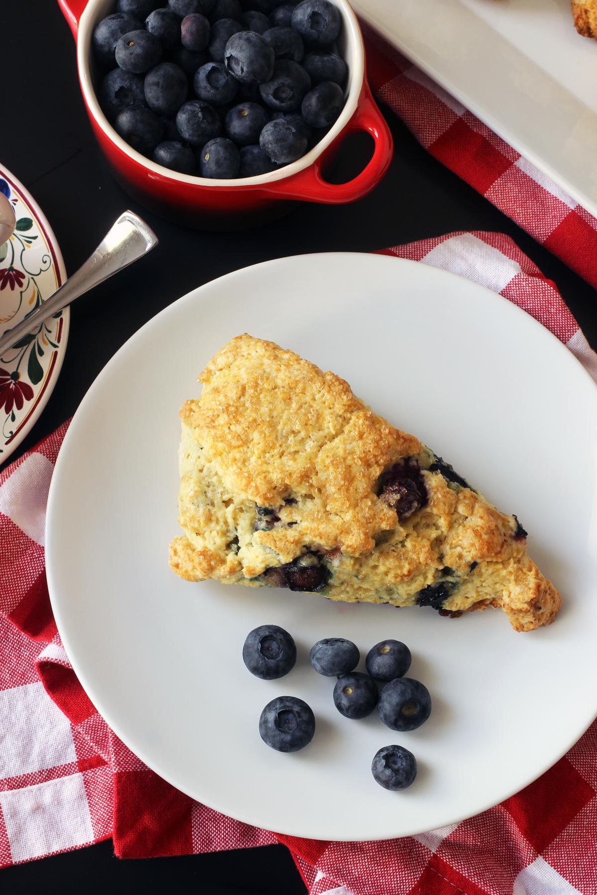 scone on plate with berries