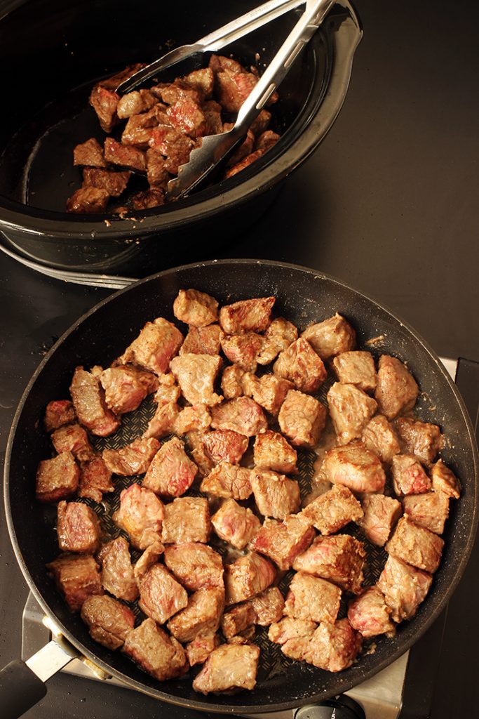 browning beef cubes in skillet
