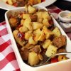 dish of home fries on red checked cloth