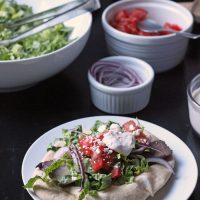 a steak gyro on a plate