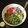 bowl of cactus with salsa ingredients unmixed