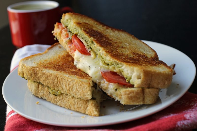 A sandwich cut in half on a plate