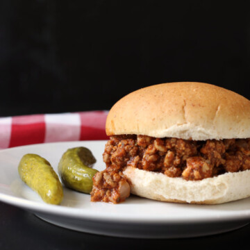 A close up of a sloppy joe on a plate