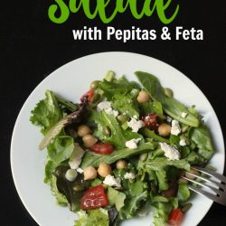 A plate of salad with feta cheese