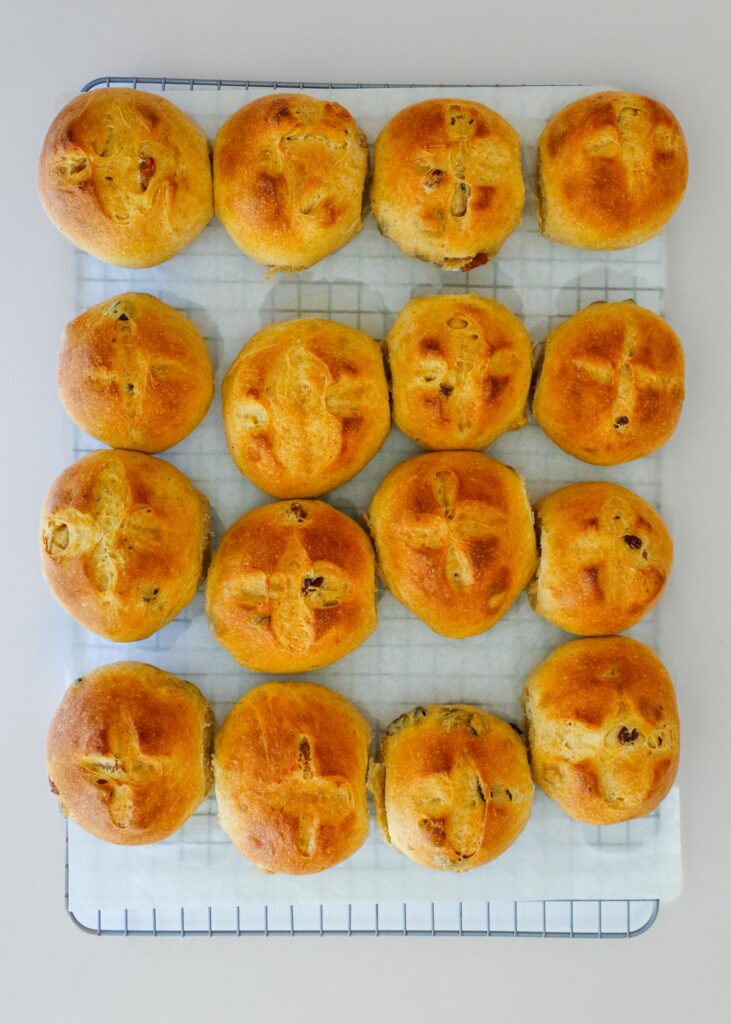 baked rolls cooling on the rack.