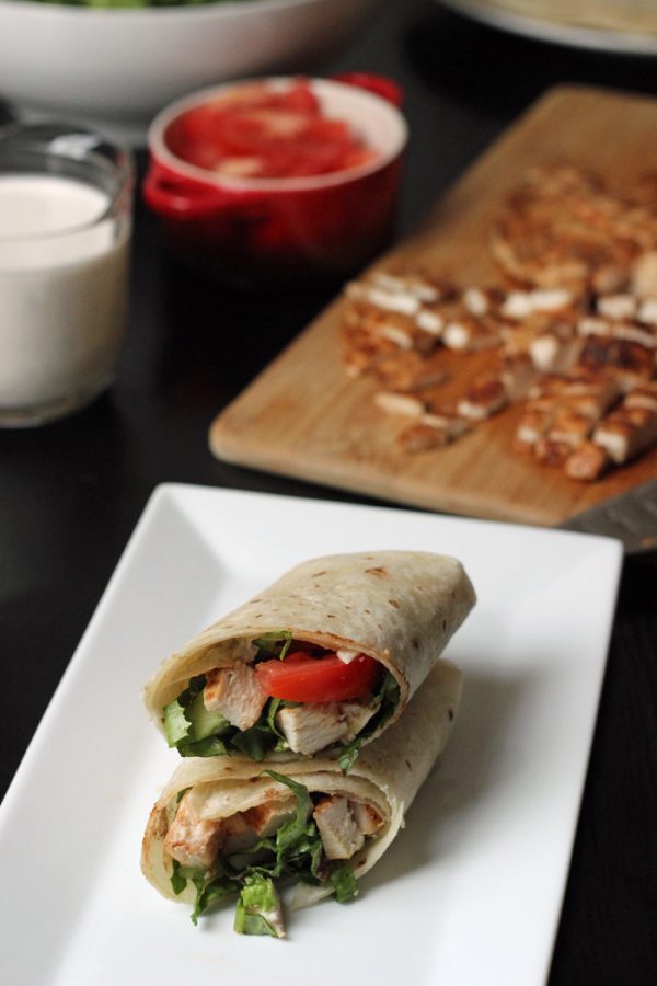 Cafe serves zesty buffalo chicken wrap with blue cheese dressing.