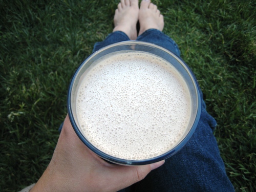 woman holding mocha in her hand