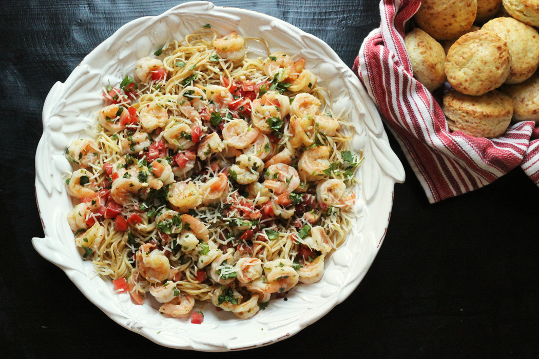 A bowl of cilantro shrimp pasta
