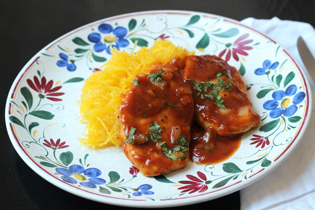 bbq pork chops on plate with squash