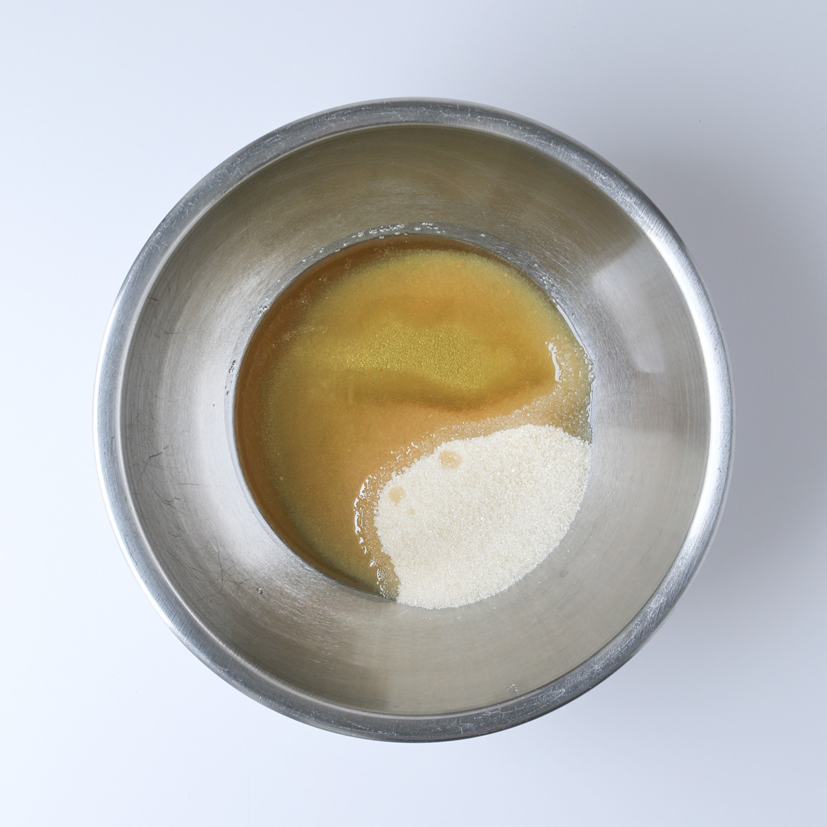 sugar and oil in bowl.