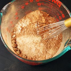 brownie mix in a bowl with whisk