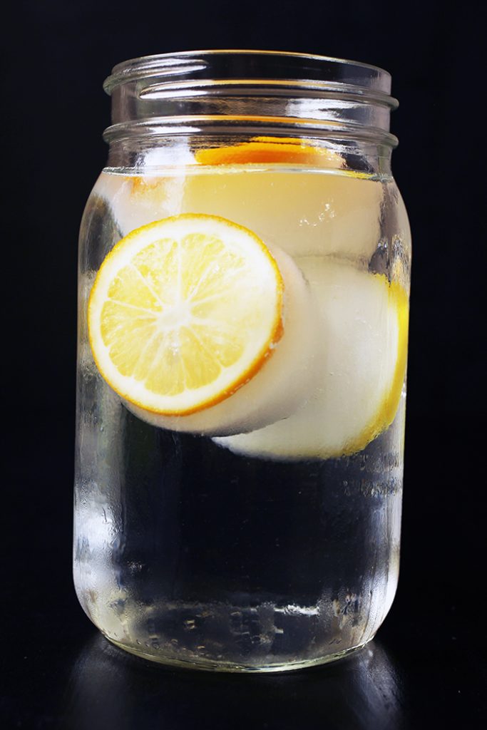 jar of water with lemon ice cubes