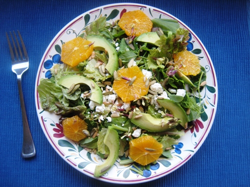 orange and avocado salad on a plate