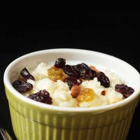 Cream of Rice in a green bowl with toppings