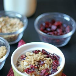 bowl of oatmeal with toppings and milk