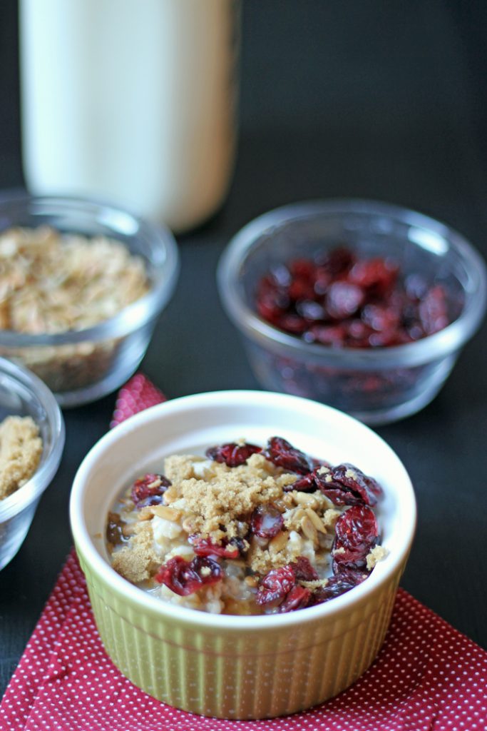 bowl of oatmeal with toppings and milk