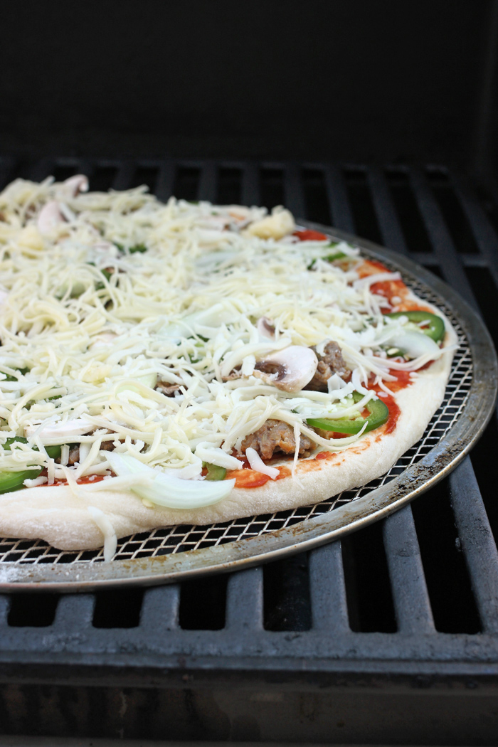 pizza on the grill uncooked